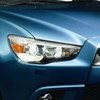 Sporty headlights and integrated front fog lamps.
Chrome lined front grille exudes sportiness and the mark of ASX.